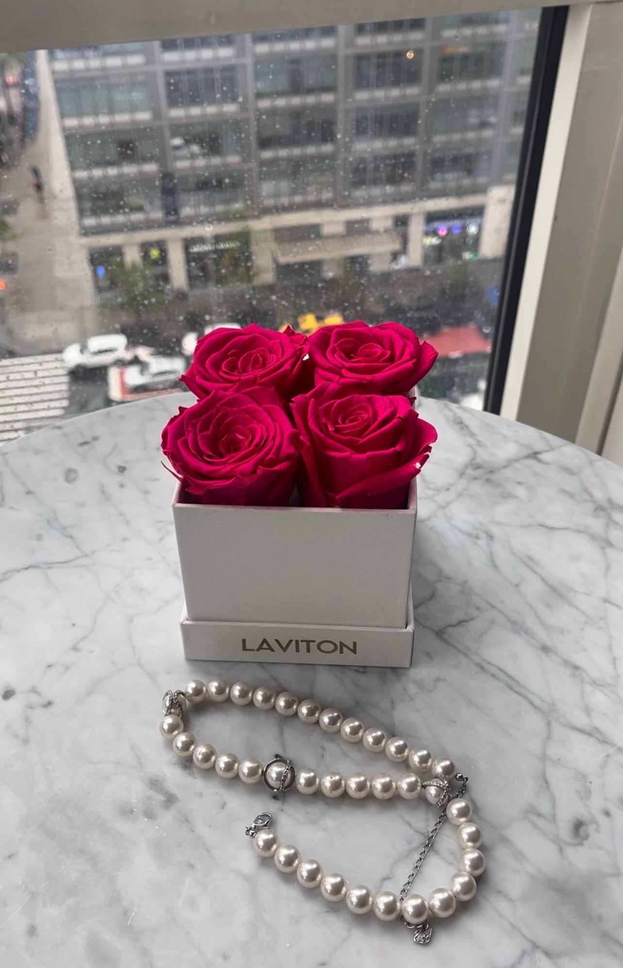 HOT PINK ETERNITY ROSES IN WHITE BOX